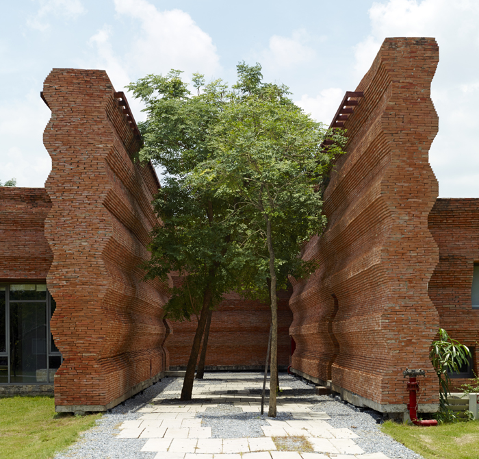 Kantana Film and Animation Institute - Corrugated brick walls and trees