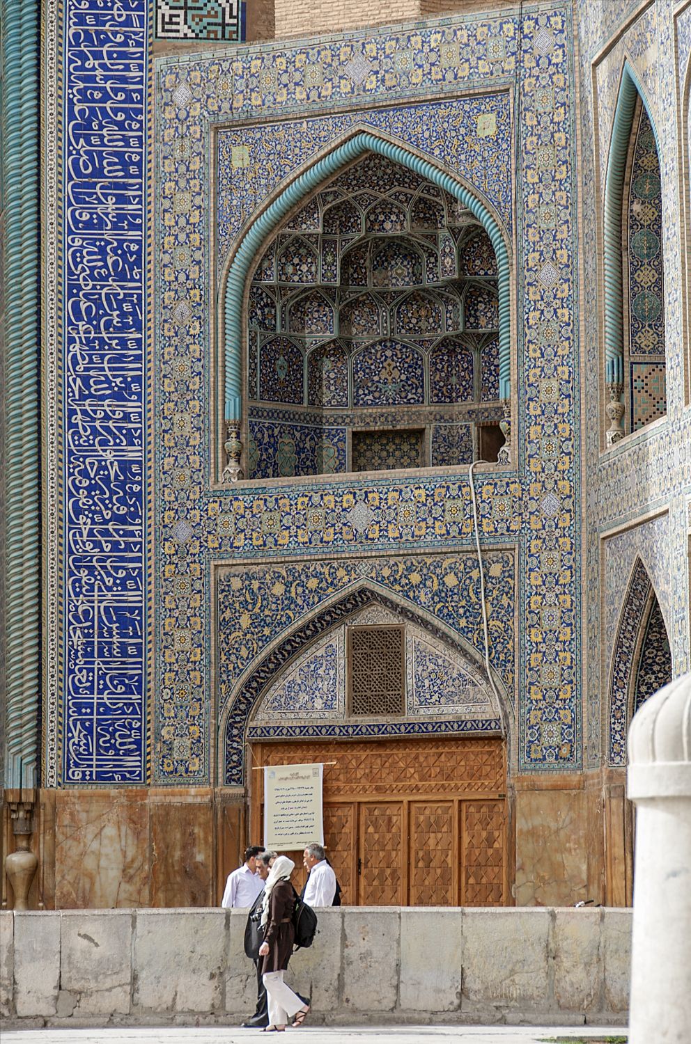 View of balcony with muqarnas vault in west flank of entry portal.