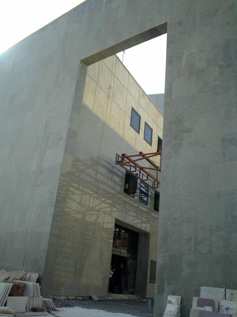 Main entrance on the east facade showing the cinema hall's entrance
