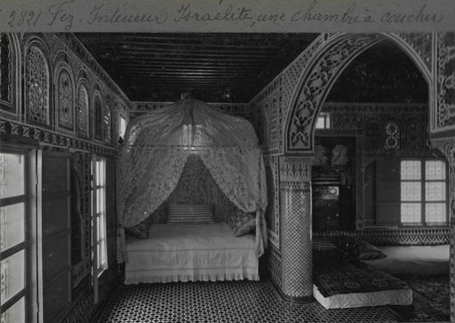 Jewish Residences of Fez - Interior view of bedroom adjacent to living room in Jewish household / "Fez, Intérieur Israélite, une chambre à coucher"