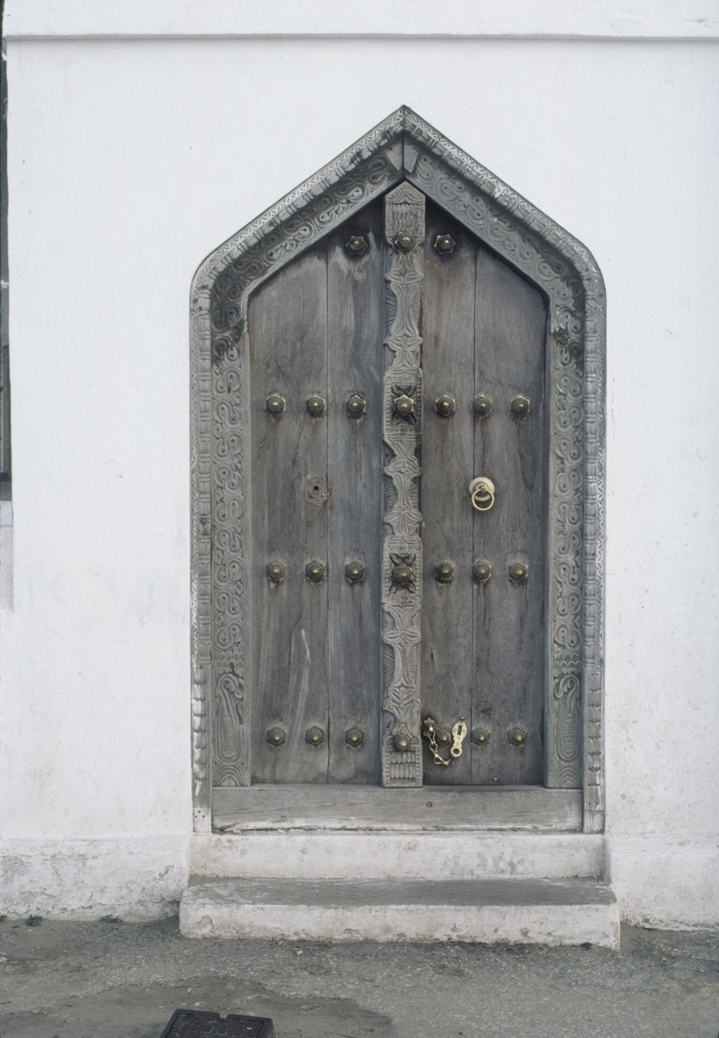 Detail of wooden door in gate at north face