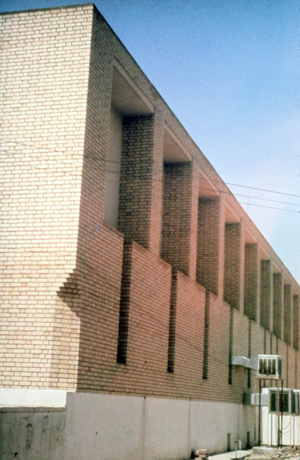 <p>Oblique view of corner, showing decorative brickwork, including a chamfered corner.</p>