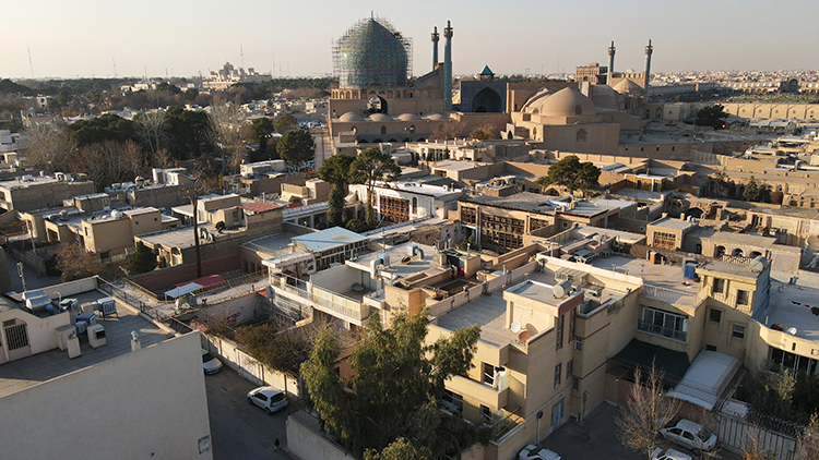 <p>Aerial view of the house showing the dome of the great Shah Mosque in the background.&nbsp;</p>