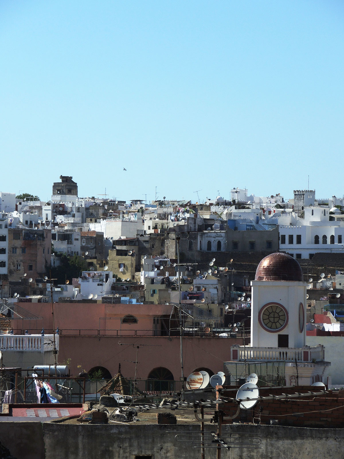 View from the terrace on the 3rd floor looking toward the Qasba.  Visible in the foreground, lower right is the copper dome of the tower on the Church of the Immaculate Conception