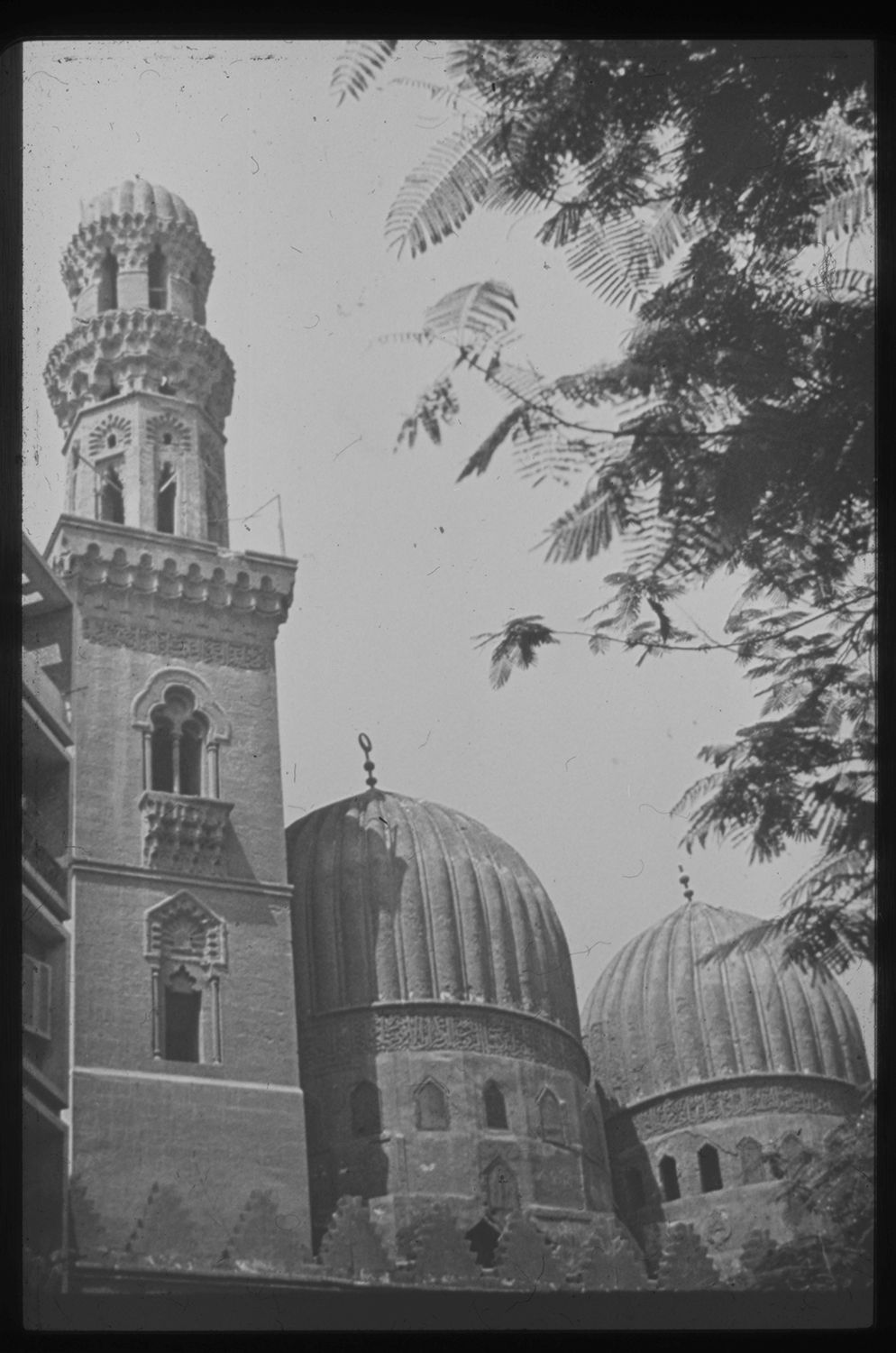 <p>Exterior view showing domes and minaret.</p>