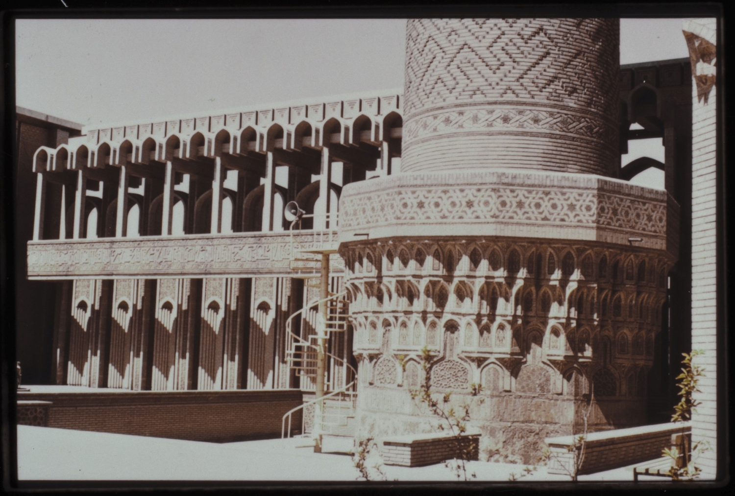 Courtyard, detail of base of minaret; with riwaq
