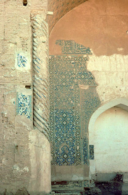 Detail of portal with tile mosaic on cable column