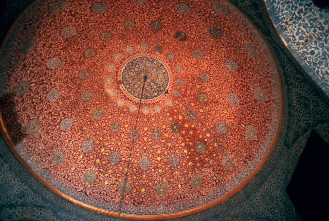 The restored dome of the Baghdad Kiosk, painted with red and gold floral motifs on gazelle skin