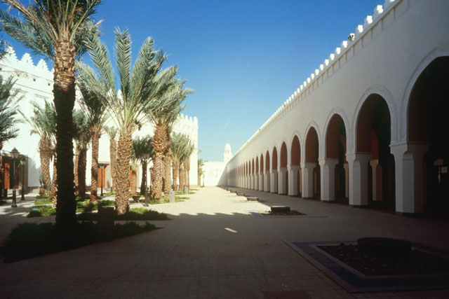 Exterior view showing courtyard area and covered porticos