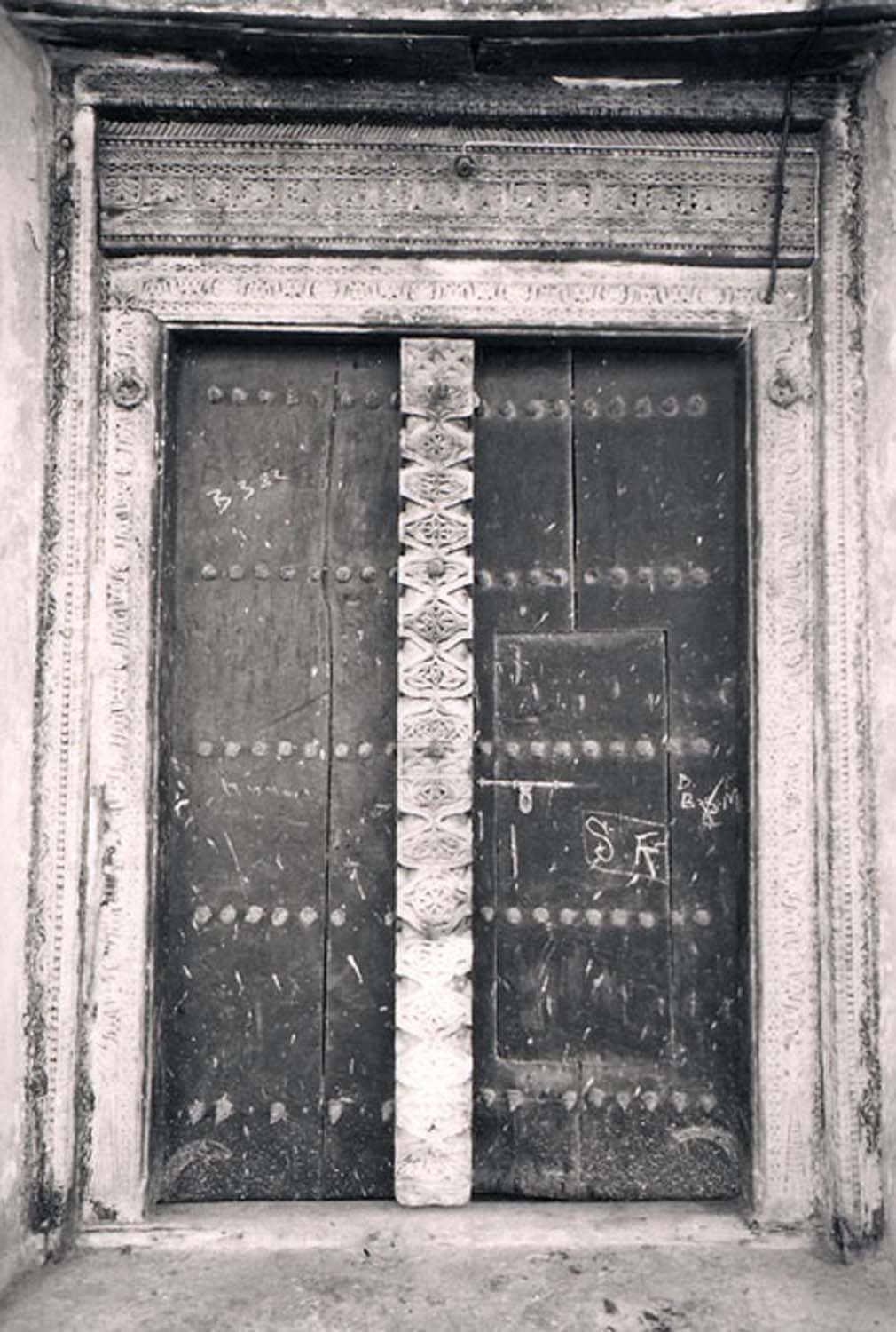 View of carved centerpost of Swahili door in place
