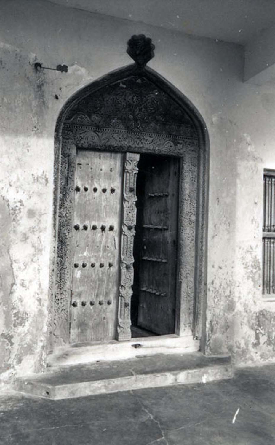 Exterior view of the Swahili door of a sea-front building near the Lamu Museum