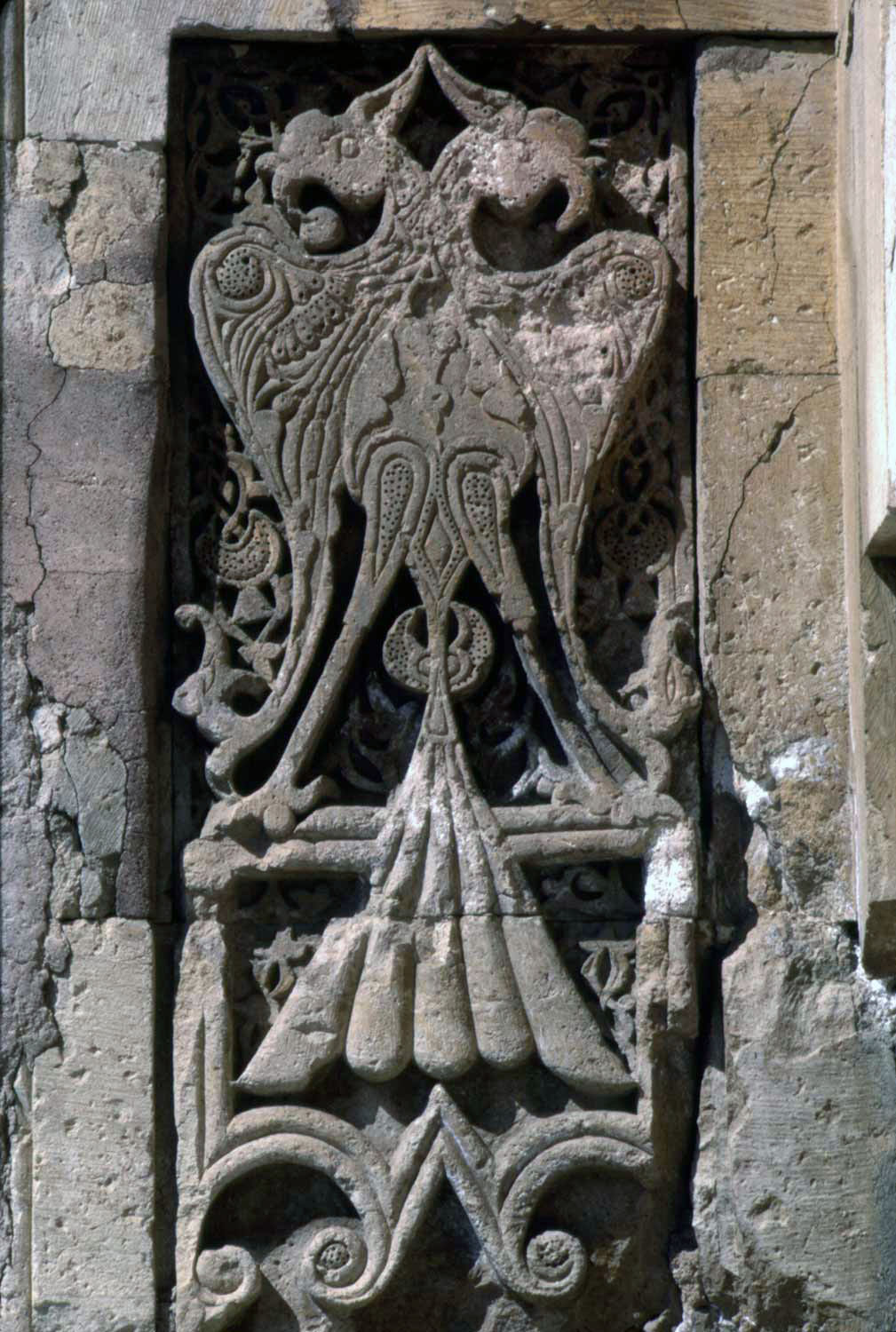 Two -headed eagle carved in west portal of mosque