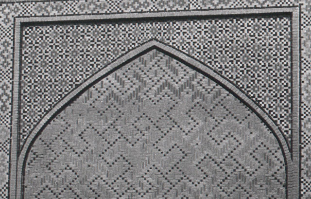 Exterior detail of Firuzshah Madrasa, showing tile mosaic on brick portal screen