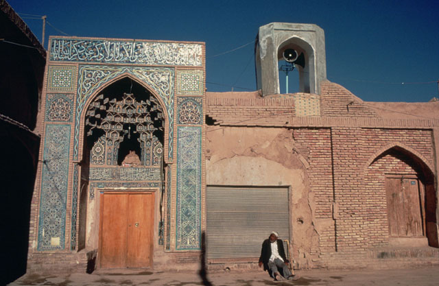 Exterior view from east with muqarnas pishtaq and minaret