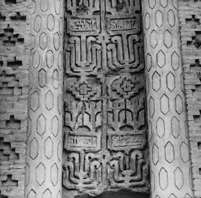 Detail view of the brick and carved stucco decoration