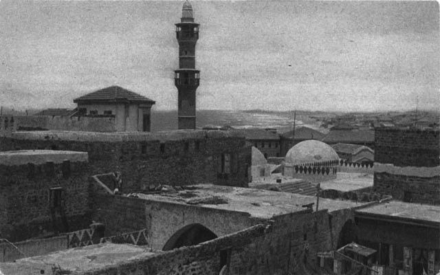 minaret and main domes with Old Jaffa's rooftops in the foreground
