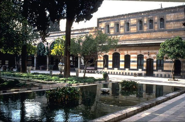 Courtyard of the haremlik contains pools, orange trees, and patterned marble floors, and is the largest of four courts