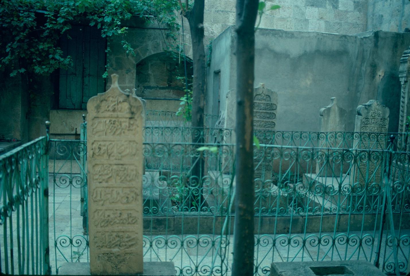 Tombstone in mosque courtyard