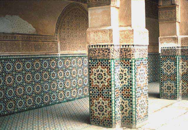 Ben Youssef Madrasa - Courtyard arcade with glazed tile dado