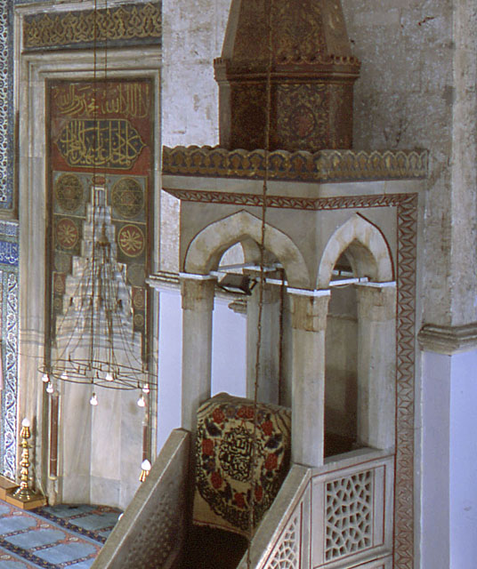 Muradiye Külliyesi - Interior detail showing pulpit and crown of minbar, with mihrab seen behind