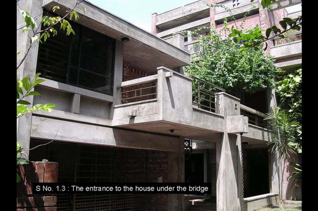 Entrance to the house under the bridge