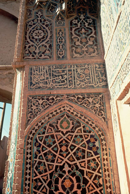 Detail of pishtaq; tile mosaic and inscription on left flank