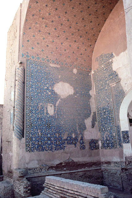 Detail of portal with tile mosaic in soffit of archway