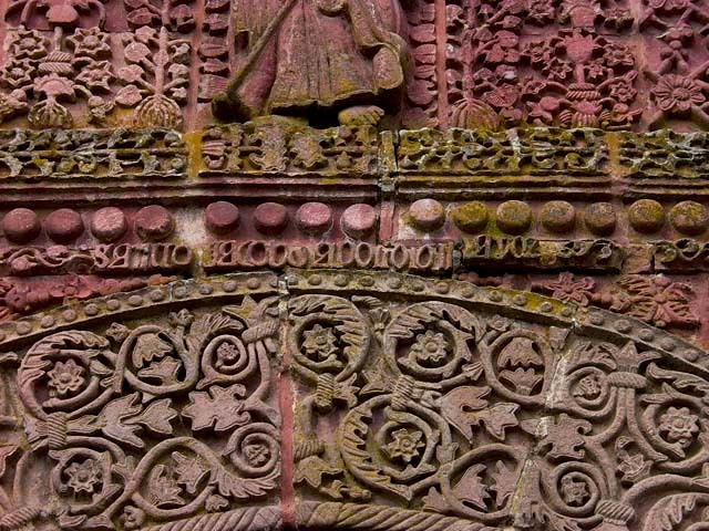 Detail view of inscription above main portal arch