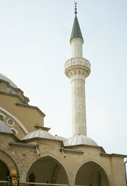 Exterior detail from north, showing portico domes and minaret