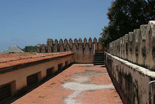 View of fort rampart with steps at the far end leading up to upper level of fort bastion