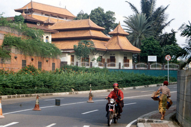 Exterior view from street showing gated pagoda inspired buildings