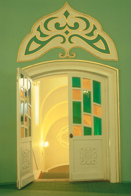 Interior detail of glass work and plaster design of door