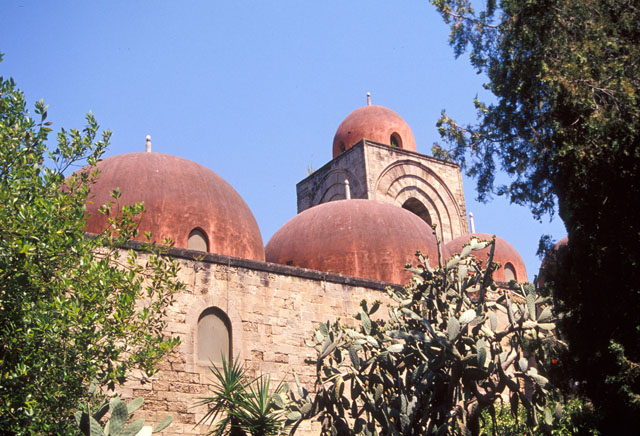 Exterior view, showing domes of nave and bell tower