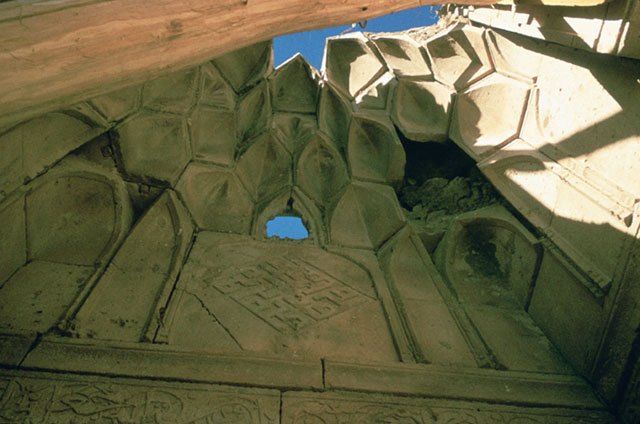 Detail of main portal, muqarnas semi-vault under restoration