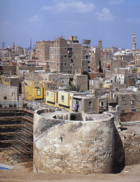 Elevated view showing the tower and its neighborhood, during the restoration of the walls