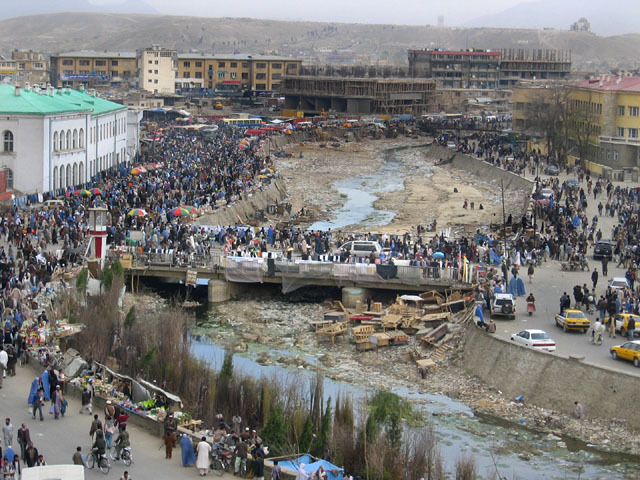 View of Kabul River in winter, looking east towards Bagh-e Umumi Bridge in the background