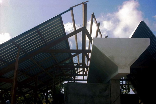 View during construction, showing metal roofing