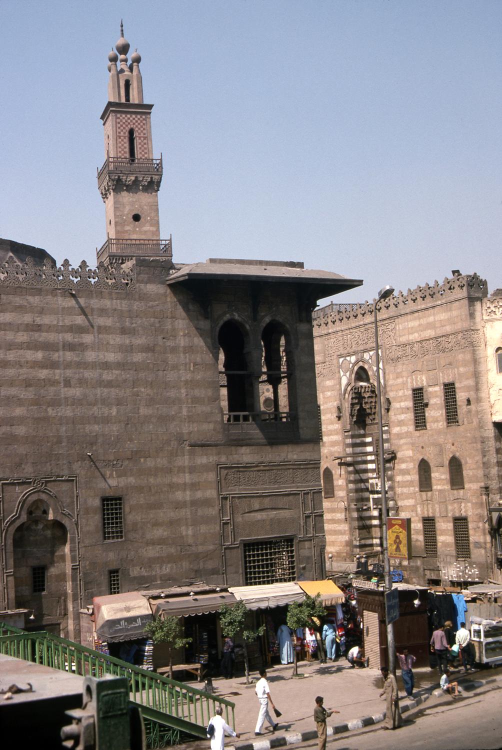 Exterior view looking southwest, showing mausoleum-sabil-kuttab (left) and mosque-madrasa (right)