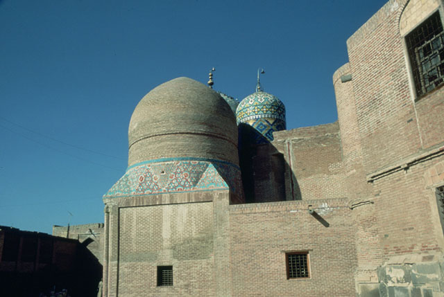 Imamzadah Shaykh Ṣafi al-Din Ardabili - Exterior view showing Haramkhana with Shah Isma'il Tomb seen to the right. The finial of Shaykh Safi Tomb appears in the background