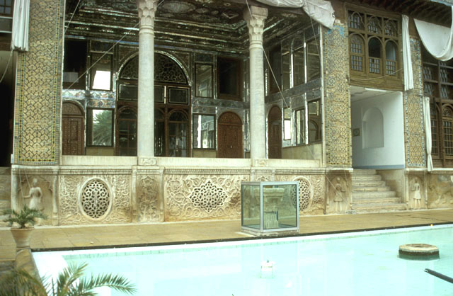 Central portico at <i>biruni</i>, with pool in front