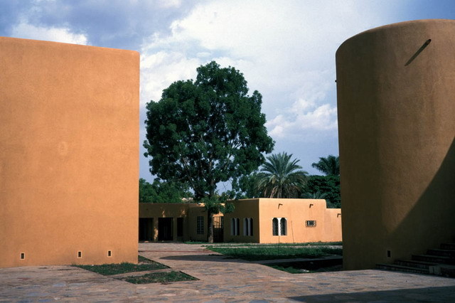 Exterior view; clay-finished walls