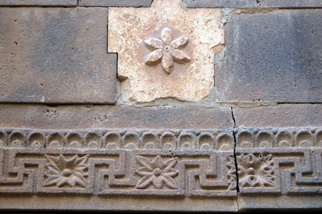 Lintel detail in the internal courtyard with fret (meander) pattern.