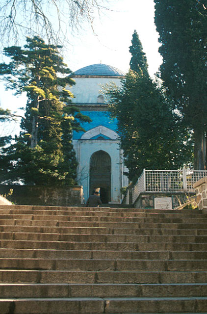 Looking at the entrance to mausoleum from street below, view from northwest