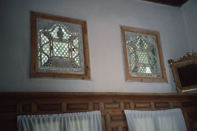 Interior view showing carved stone window treatments