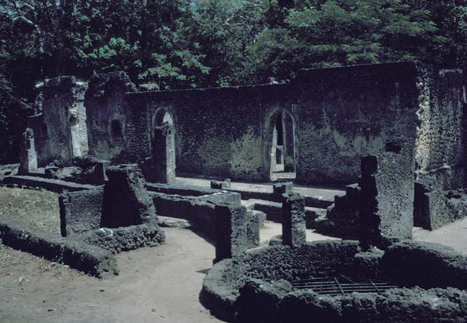 Great Mosque of Gedi - East façade of the mosque overlooking the well, the cistern and remains of stairway to the roof from the verandah.