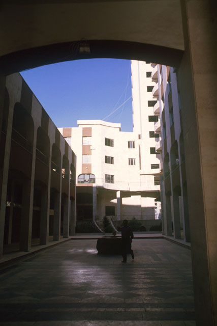 Exterior view from arcaded walkway to neighboring buildings