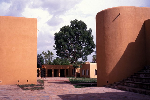 Exterior view; clay-finished walls
