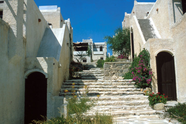 Exterior view along stone steps between buildings