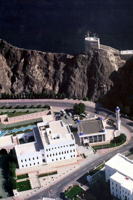 Muscat Old Town Rehabilitation - Aerial view showing complex abutting mountain-ridge