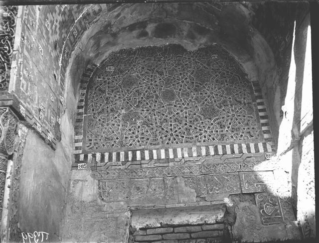 Khwaja Ahmed Mausoleum - Detail of the entry iwan tympanum, decorated with tile mosaic